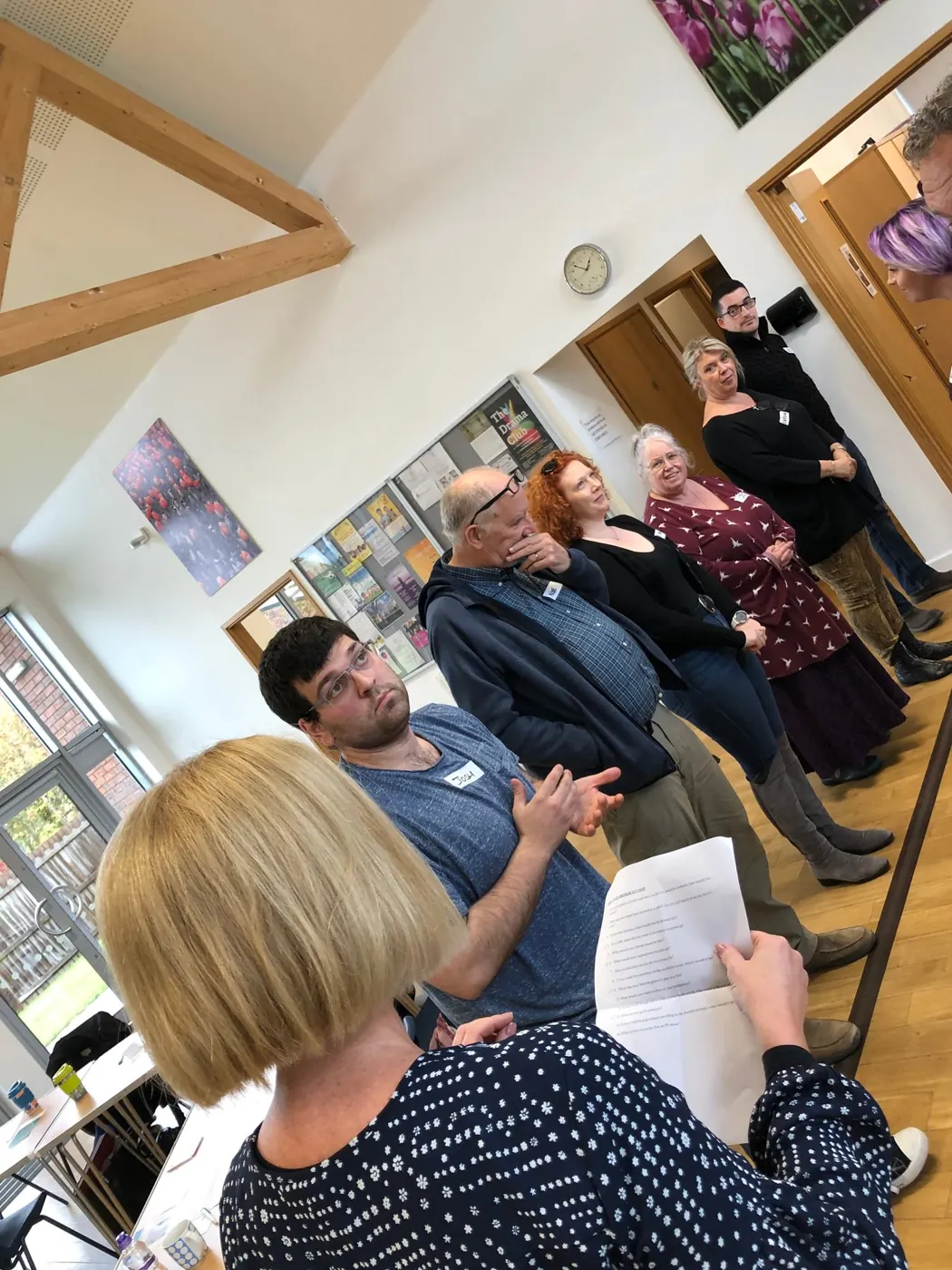 Participants standing in a line during an Emotional Fitness Power and Rank group exercise